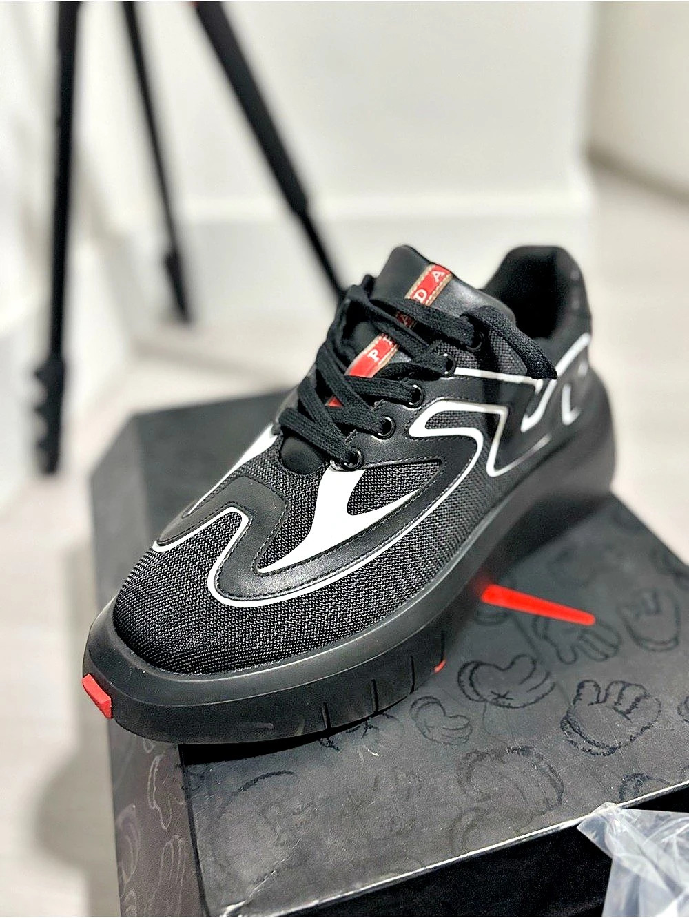 Prada Speedrock Leather and Mesh Fabric Sneakers Black & White